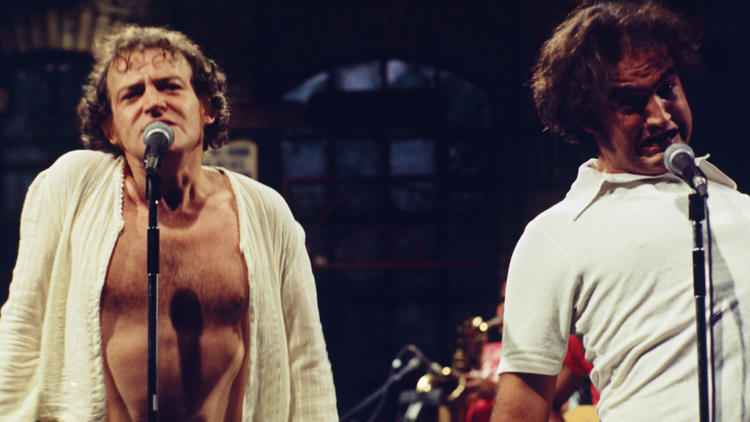 Joe Cocker performs with John Belushi on Saturday Night Live on Oct. 2, 1976.